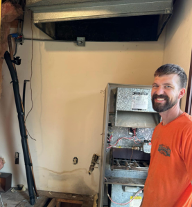 Julian Heat and Air tech installing a furnace