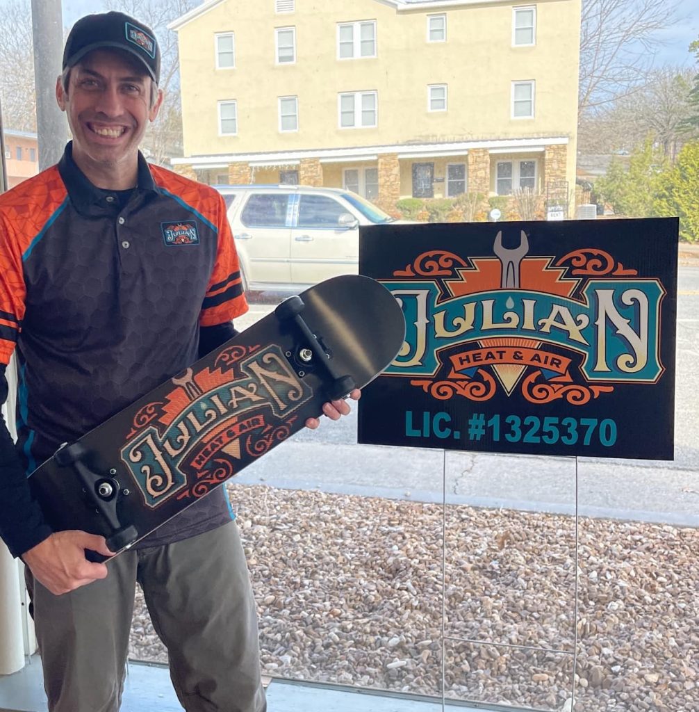 Julian Heat and Air, Owner with a skateboard