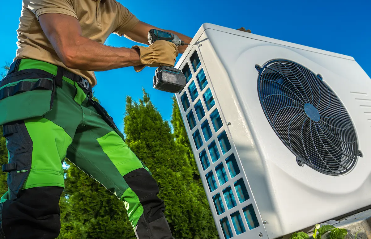 hvac technician fixing ac