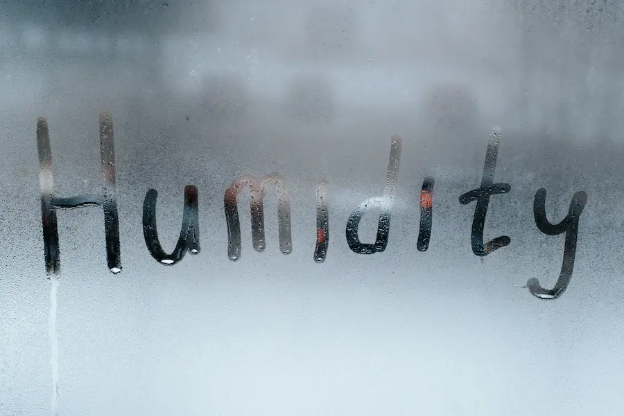 Huymidity written on misted wet window glass